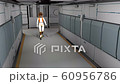 Space cyborg trooper walking in sci-fi corridor. 60956786