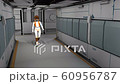 Space cyborg trooper walking in sci-fi corridor. 60956787