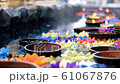 Flower candle in basin, Buddhism for blessings	 61067876