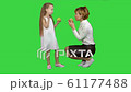 Happy mother with daughter eating healthy food on a Green Screen, Chroma Key 61177488
