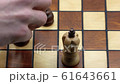 Checkmate With Pawn And Queen On A Wooden Chess Board, Slow Motion 61643661
