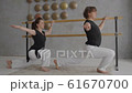 Coach and student study a fragment of dance overall outline 61670700