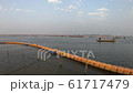 boat floats sangam conclusion of three holy rivers Kumbha Mela Allahabad 2019 blue sky 61717479