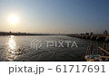 Triveni Sangam confluence of three holy rivers stopgap bridges  silhouettes of people move 61717691