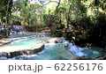 Turquoise swimming pools of Kuang Si Waterfalls in Luang Prabang, Laos 62256176