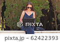 Portrait of business woman with laptop working at park 62422393