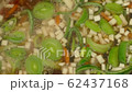 boiling vegetable soup top view closeup 4k 62437168