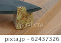 peeling celery on a cutting board with a kitchen knife closeup 4k 62437326