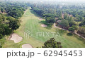 Ariel view of golf course in the morning  62945453