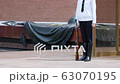 Soldier near Eternal flame at the memorial tomb of the Unknown Soldier of World War II on Red Square 63070195
