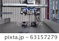 Close up - Automatic Plastic Injection Molding Machine, Robotics Arm Inserts Plastic Component for the Automotive Industry on the Conveyor Belt from the Injection Mold in Automotive Factory 63157279