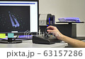 Professional 3D Scanner,Close Up, Scanning an Industrial Part using a Controller 63157286