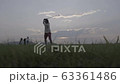 couple lover playing golf together in the course. 63361486