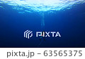 Divers emerging from the sea surface of Similan Islands in Thailand 63565375