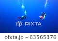 Divers at sea stop in Similan Islands, Thailand 63565376