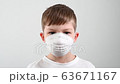 virus and flu protection concept, boy takes off the mask and rejoices 63671167