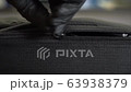 Video shows zipper closure. Lock clasp. A gloved hand closes the zipper. Extreme close-up 63938379