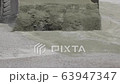 Tractor loader picking up soil in a large bucket during the construction of the road, background, industry, FullHD, multifunctional 63947347