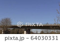 Cars ride on a high bridge bottom view 64030331