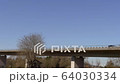 Cars ride on a high bridge bottom view 64030334