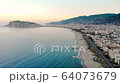 Aerial drone footage, morning in the city by the sea 64073679