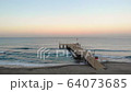 Aerial drone footage, morning in the city by the sea 64073685