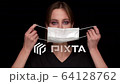 funny Woman not correctly Puts on Medical Mask 64128762