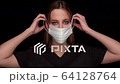 funny Woman not correctly Puts on Medical Mask 64128764