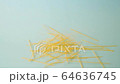 Broken spaghetti falling down on blue abstract background. 64636745