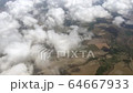 Flying over the farms in Alagoas state, Brazil, with clouds all over. 64667933