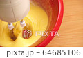Preparation of sweet cream in bowl with mixer 4K 64685106