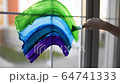 Little boy drawing on window rainbow while coronavirus quarantine. Rainbow sign is symbol of hope, means that everything will be OK. Stay home for lockdown coronavirus. 64741333