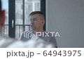 Sad pensive caucasian man shares his addiction story 64943975