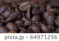 Close-up rotating coffee beans. Grains arabic coffe 64971256