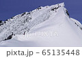 Looking at the Okino ears and climbers from the Tomano ears of Mount Tanigawa in Gunma Prefecture in winter 65135448