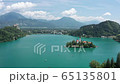 Over the lake Bled overlooking the island and mountains 65135801
