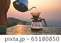Making driping coffee on the mountain. 65180850
