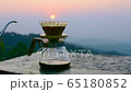 Making driping coffee on the mountain. 65180852