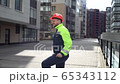 A male builder in work clothes is angry at the construction site. The concept of an engineer's disorder in the workplace 65343112