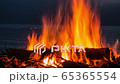 Cinemagraph of a campfire at twilight on the beach 65365554