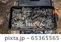 Cinemagraph of a burning fire on burnt coal in a BBQ grill 65365565