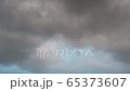 Huge thunderclouds and a flying swallows in the sky 65373607