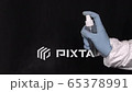 Male hands in protective suit spraying antiseptic on a black background during pandemic coronavirus quarantine time 4K 65378991