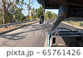 Driving through the streets by old car. 65761426