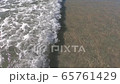 wave on the beach. 65761429