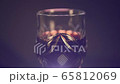 Glass of red wine on a black background 65812069