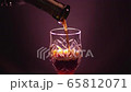 Glass of red wine on a black background 65812071