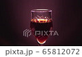 Glass of red wine on a black background 65812072