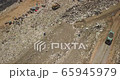 The vehicle and people working the garbage dump, garbage truck drop trash on the landfill for the excavator and people sorting garbage 65945979