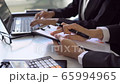 Business people working on Desk office with marketing graph statistics analysis	 65994965